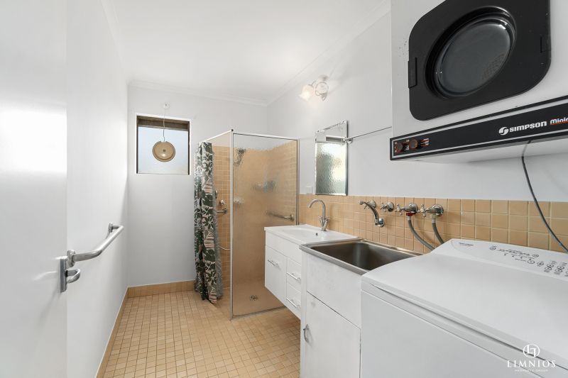 SOLD! A bright, light filled unit with a sunroom and leafy outlook