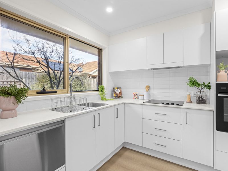 Bright Corner Unit with Stylish Upgrades and Garden