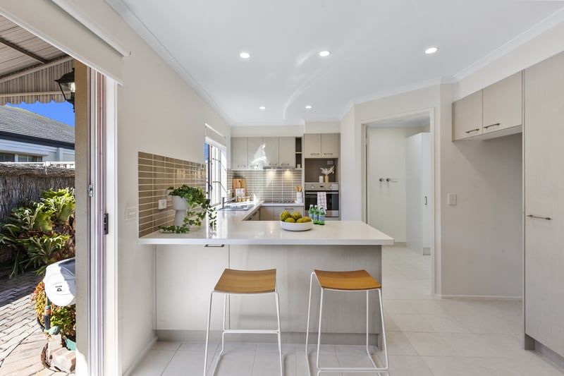 Stylish Corner Haven with Sunlit Interiors and Modern Touches