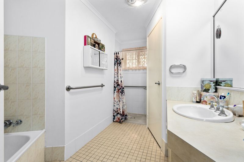 Beautiful two-bedroom, one bathroom villa with covered rear entertaining area.