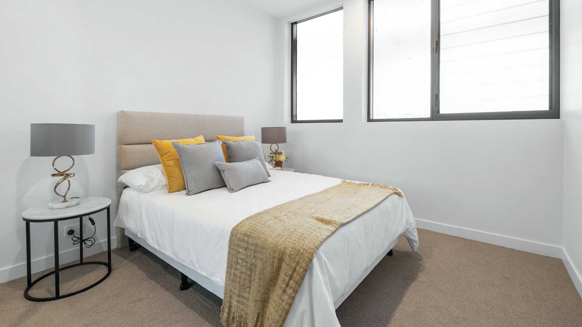 Spacious courtyard apartment surrounded by established gardens