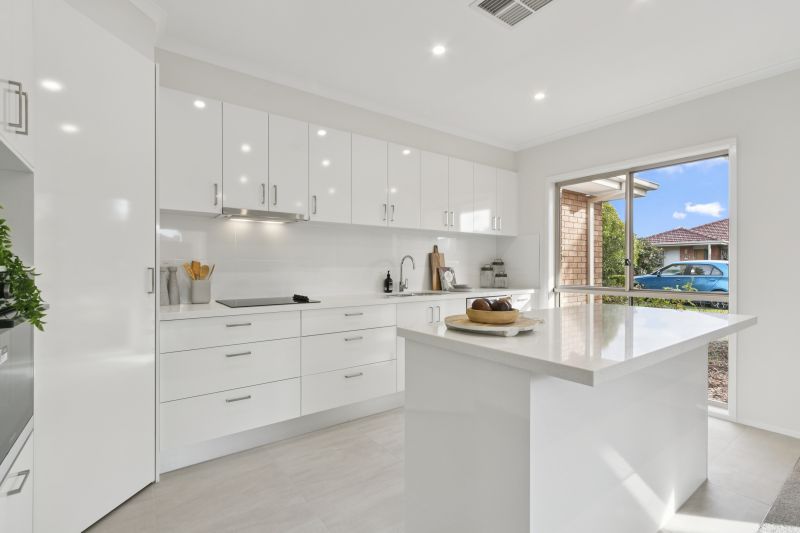 Discover serene living in this fully upgraded two-bedroom villa
