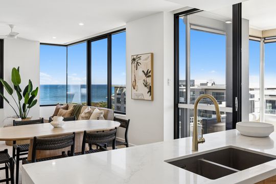 Experience exclusive beachfront living in this luxurious apartment, with breathtaking views from the hills to the sea, within this secure community