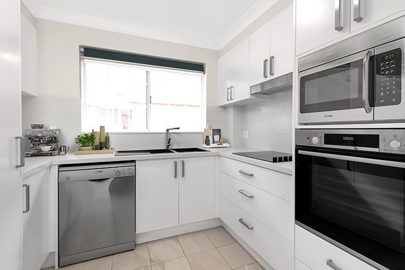 Perfectly located, renovated unit with easy ramp access and lovely district views.