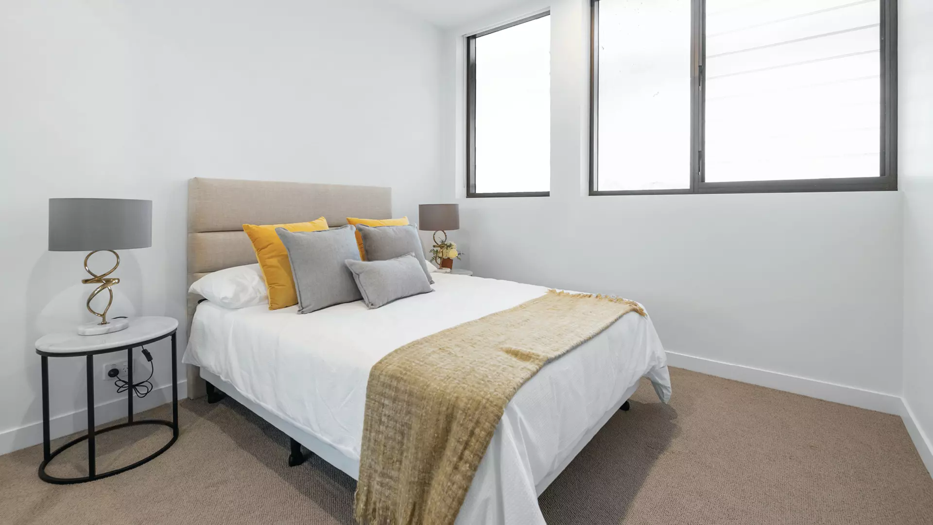 Spacious courtyard apartment surrounded by established gardens