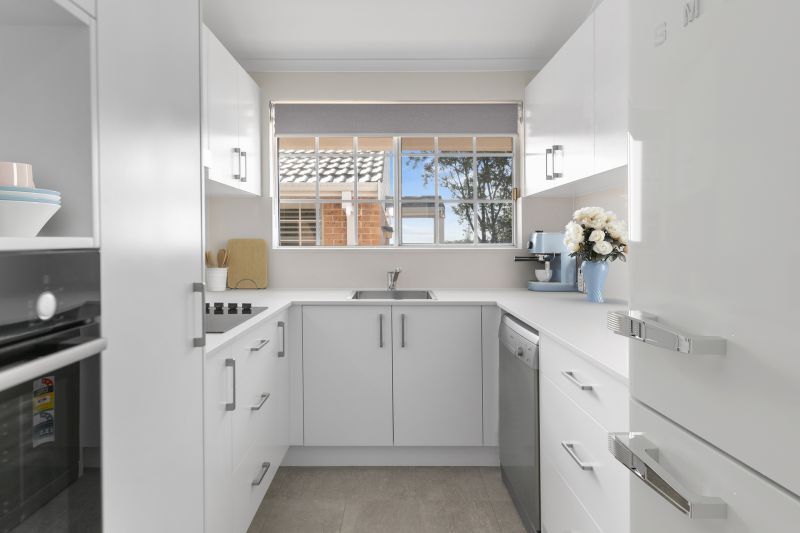 Newly renovated 3 bedroom unit with garden and district views