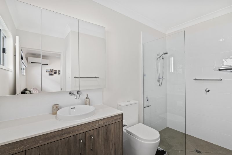 Elevated Home with Spacious Backyard and Modern Interior