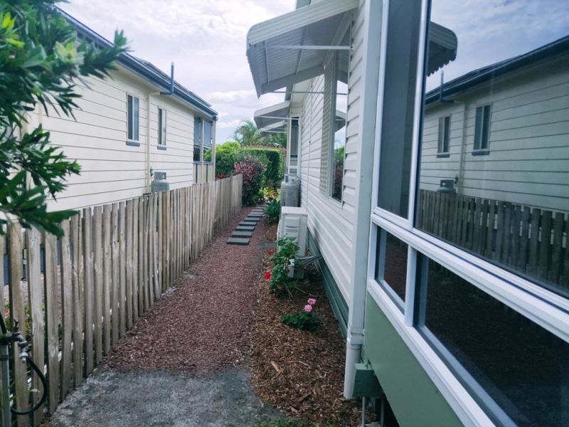 Relaxed Living in a Private Village Oasis