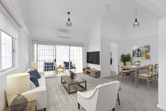 Exquisitely maintained and conveniently located sun-filled unit