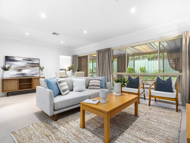 Light-Filled Living with Sunroom and Private Courtyard