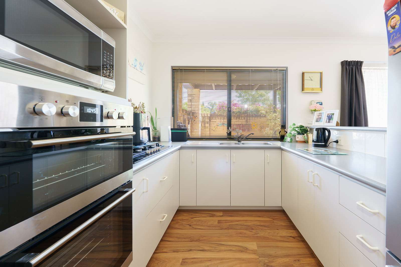 Light-filled corner home with garden views & north-facing courtyard