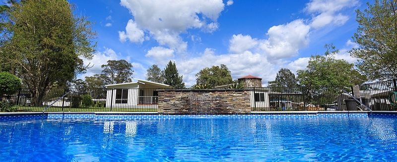 Right Opposite the Pool and Neat as a Pin!