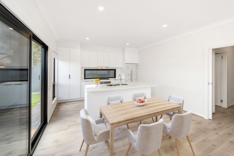 Spacious Design Inside and Out -  Large Rear Garden with Decked Entertaining Area.