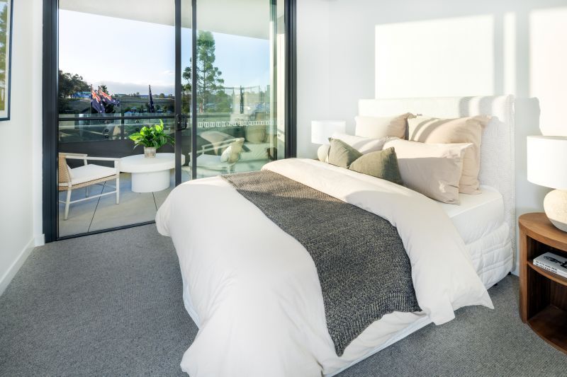 Generous, light-filled two-bedroom residence with a private balcony