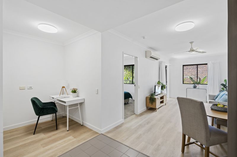 Elevated one-bedroom apartment in peaceful green setting