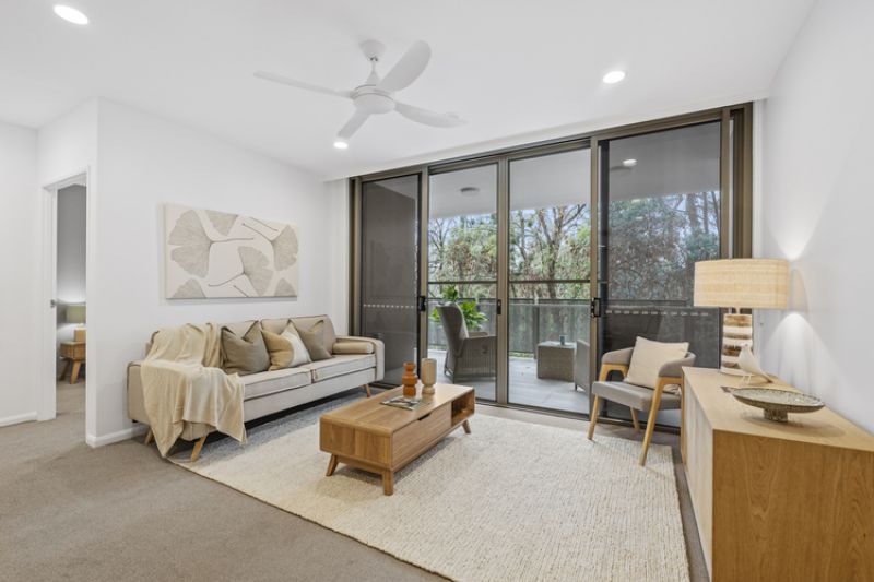 Elegant two-bedroom apartment with peaceful, tree-lined outlooks