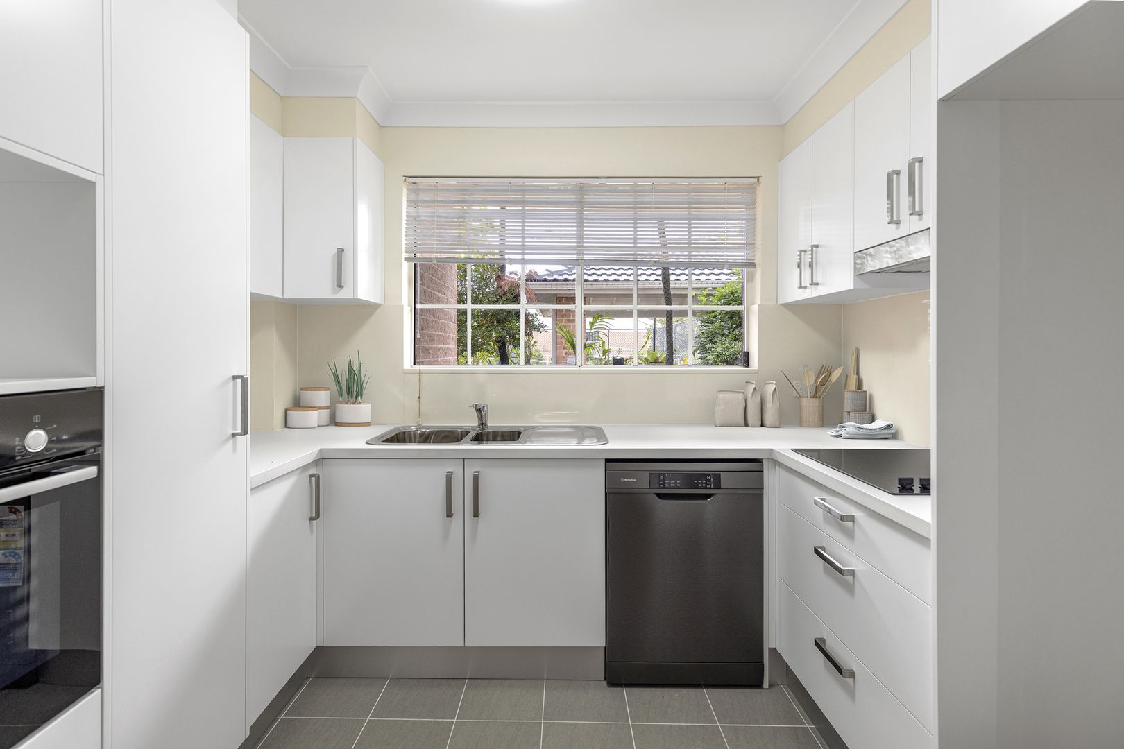 Stunning garden unit with sunny north-facing terrace and district views