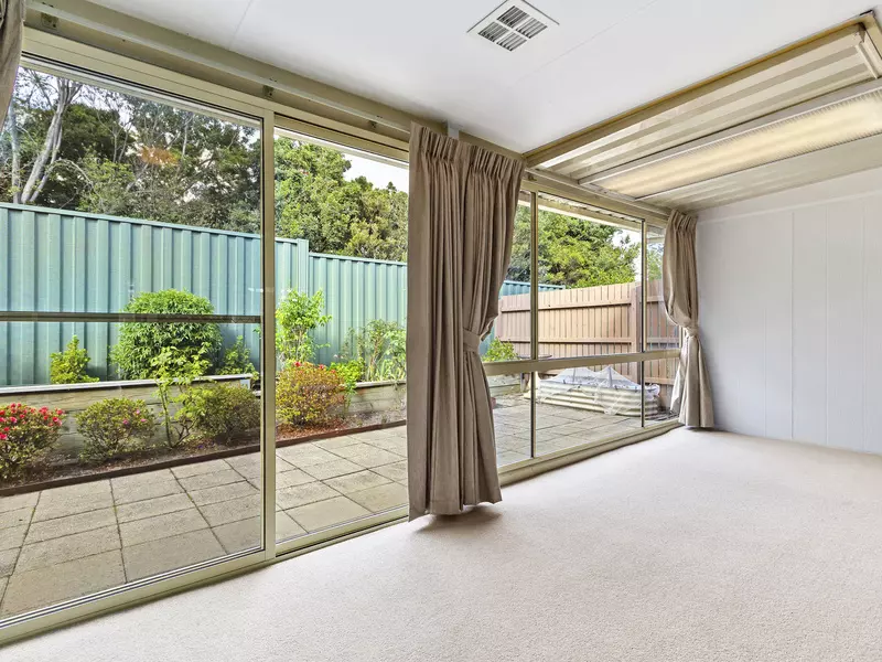 Light-Filled Living with Sunroom and Private Courtyard
