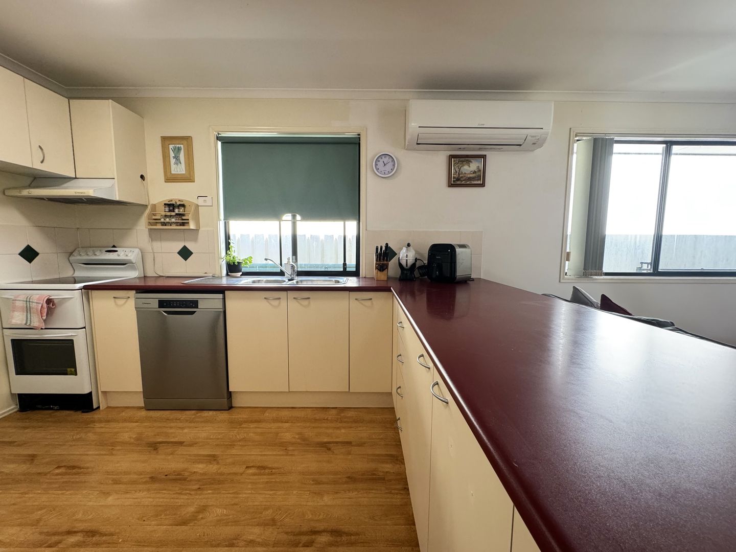 DOWNSIZE in comfort ... into a 2 bedroom home within a secure gated complex !