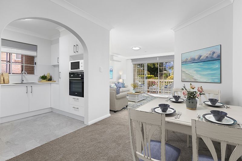 Newly renovated and superbly positioned unit with sunny front terrace and large courtyard.