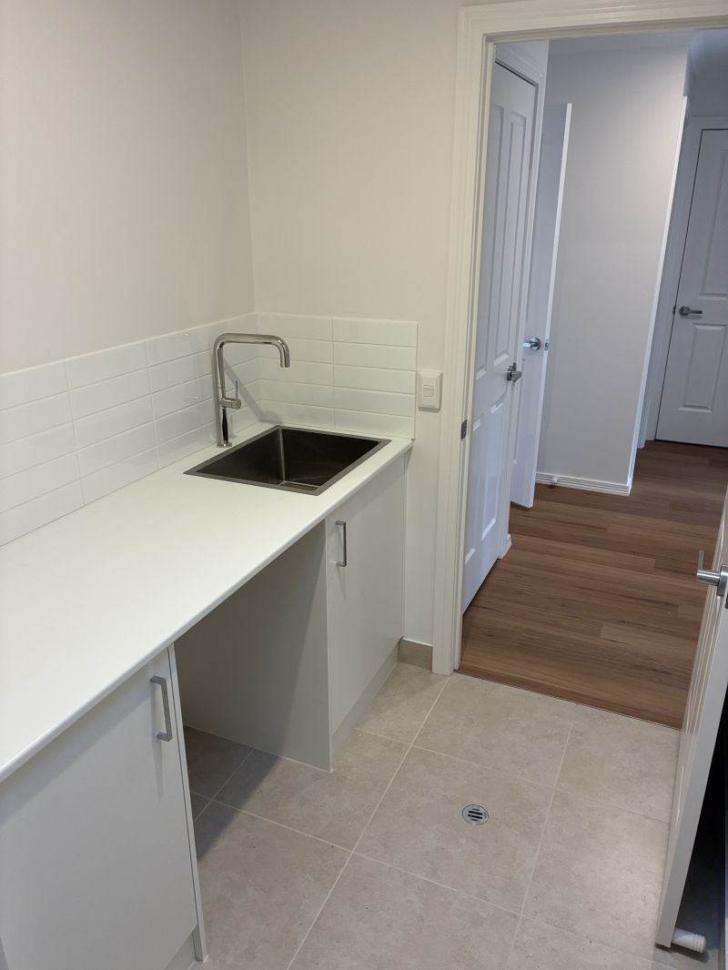 Beautifully Refurbished Two-Bedroom Home Opposite the Community Centre