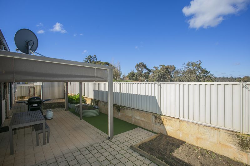Open plan living situated on a large, elevated block.
