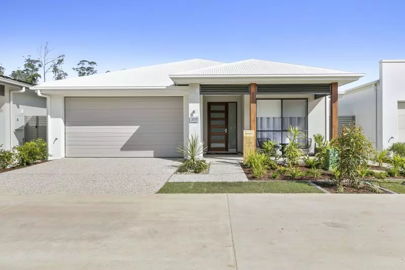 STUNNING DISPLAY HOME FACING TRANQUIL LAKE
