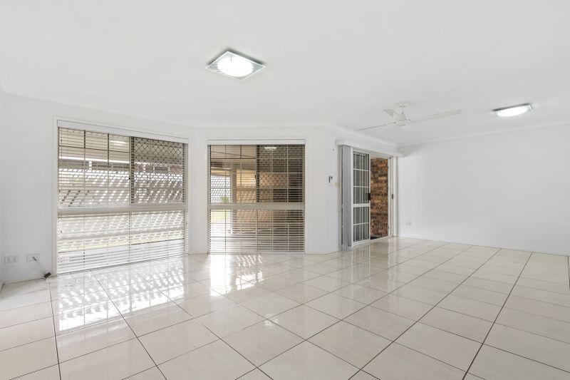 Beautiful two-bedroom, one bathroom villa with covered rear entertaining area.