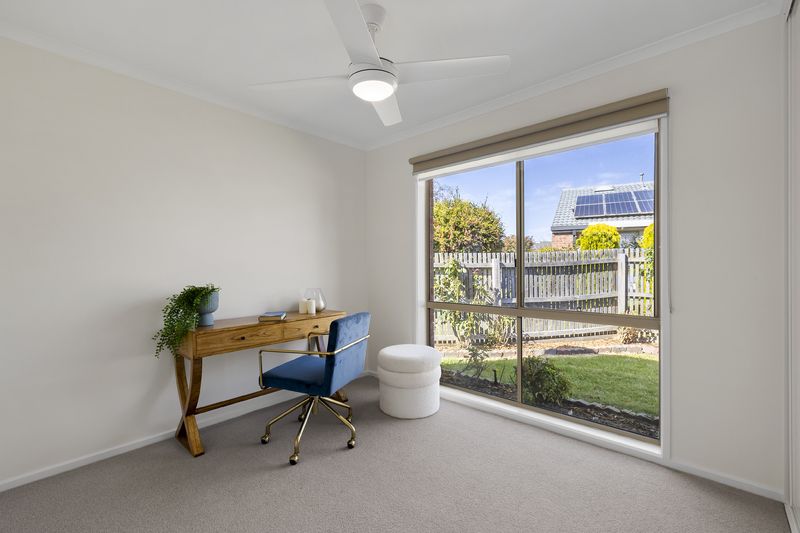 Stylish, Sunlit Unit with Private Backyard and Modern Upgrades