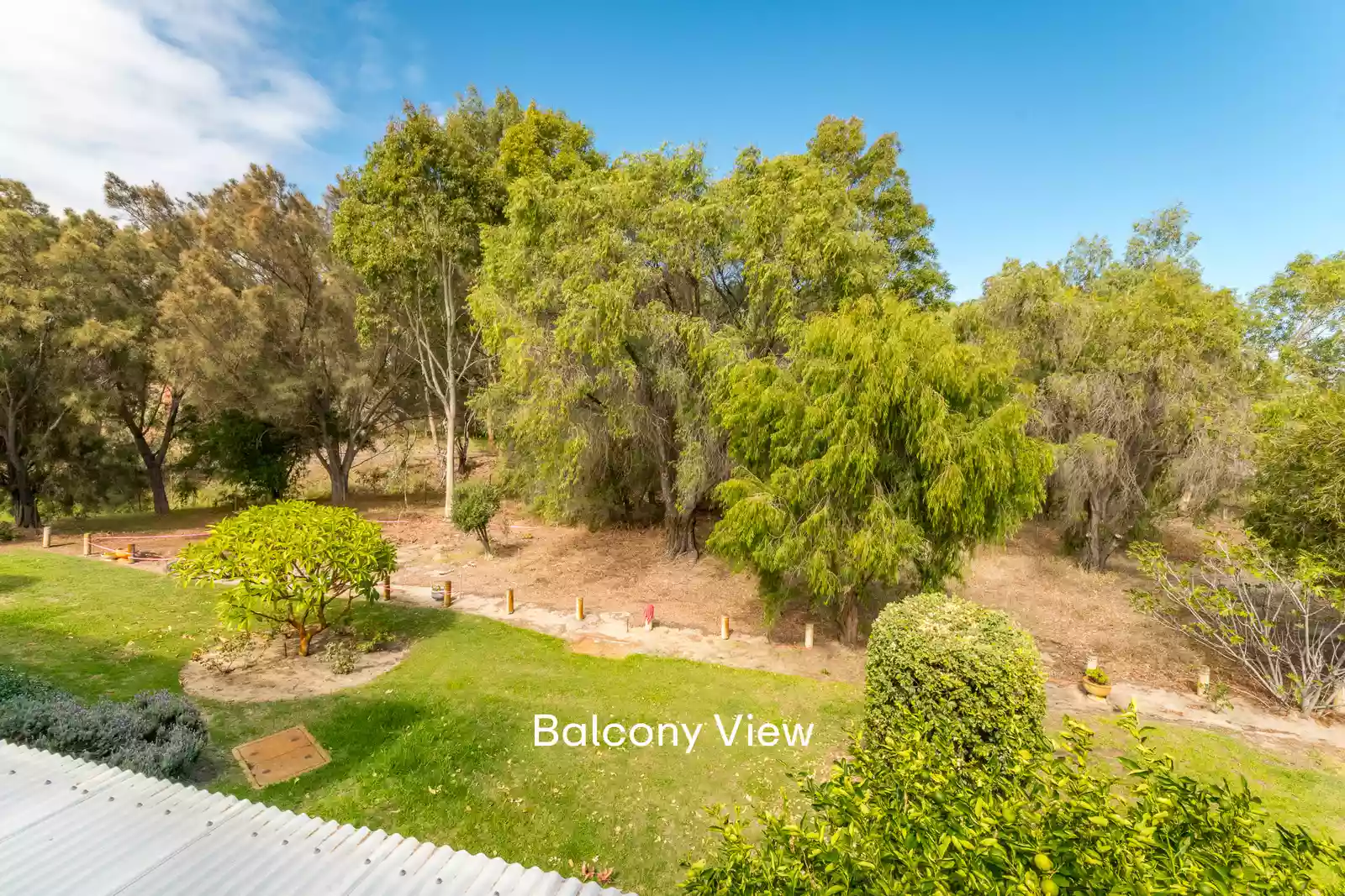 Light-filled two-bedroom villa with park views from the balcony