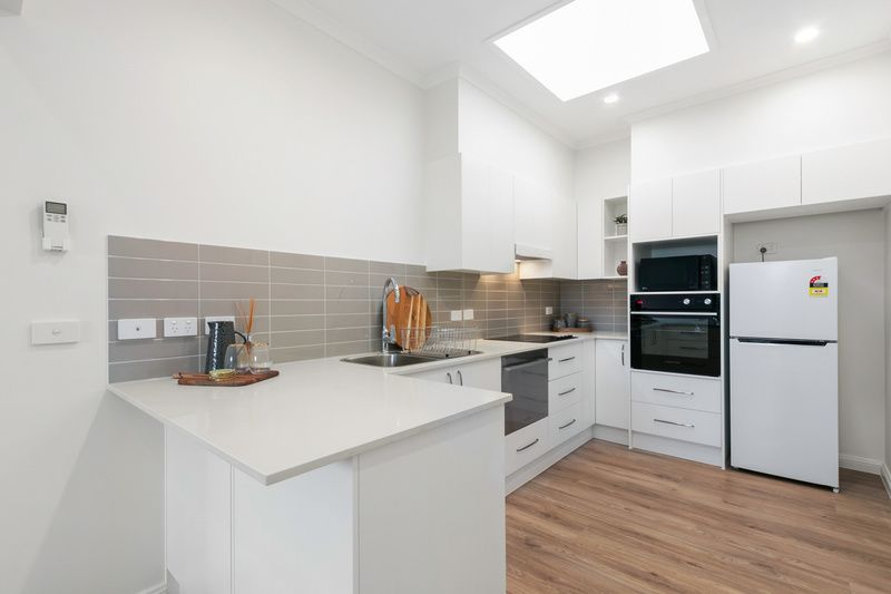 Stylishly Unit Layout with High Ceilings and New Kitchens