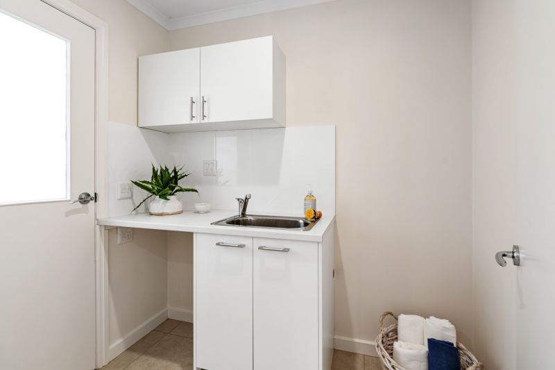 DEPOSIT TAKEN - Light & bright ground floor unit with rear courtyard and single garage