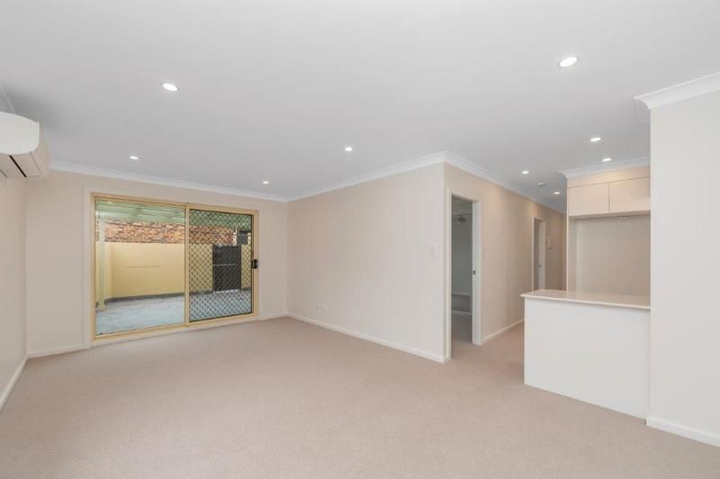 Modern, Spacious Living with Large Sunny Courtyard and Single Garage