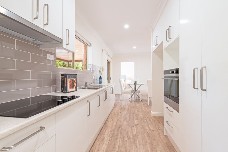 Rarely available 3 bedroom unit with double garage