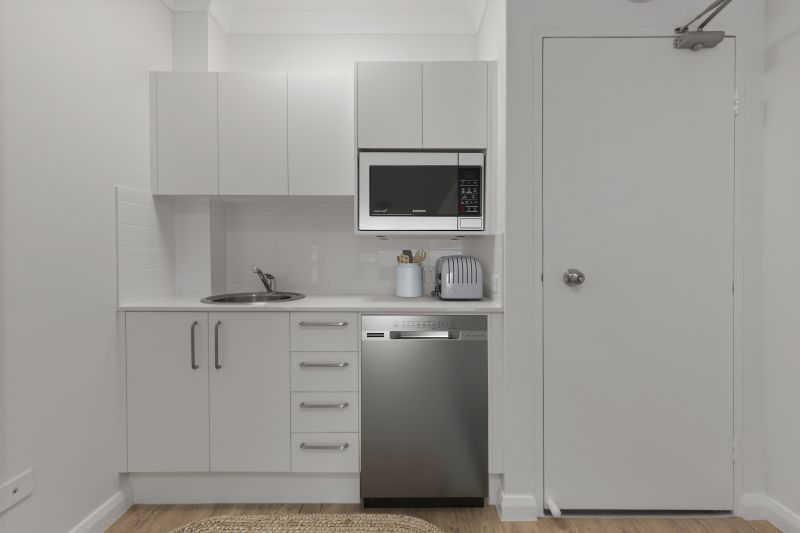 Beautifully renovated one bedroom serviced apartment with sunny, private courtyard.