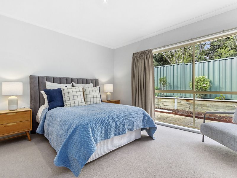 Light-Filled Living with Sunroom and Private Courtyard