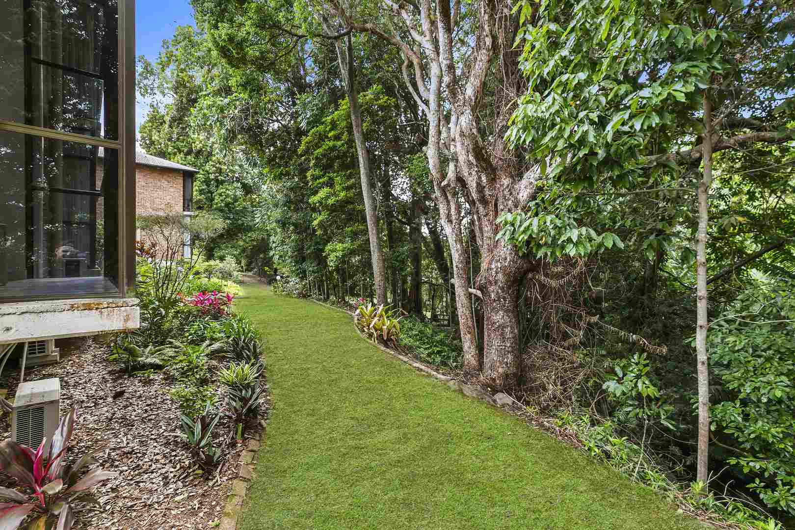 A private forest-view retreat set within a vibrant and highly desirable community.