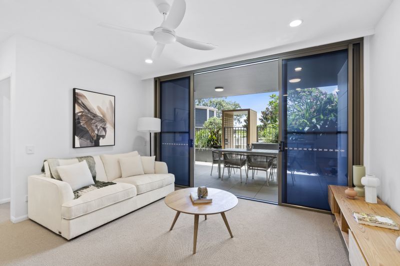 North-facing, ground-floor apartment with direct courtyard access and garden views