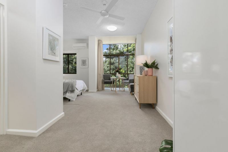 Easy-living studio overlooking the gardens and creek.