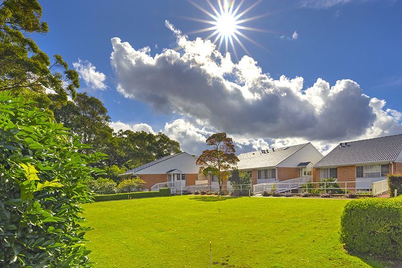 Exquisitely maintained and conveniently located sun-filled unit