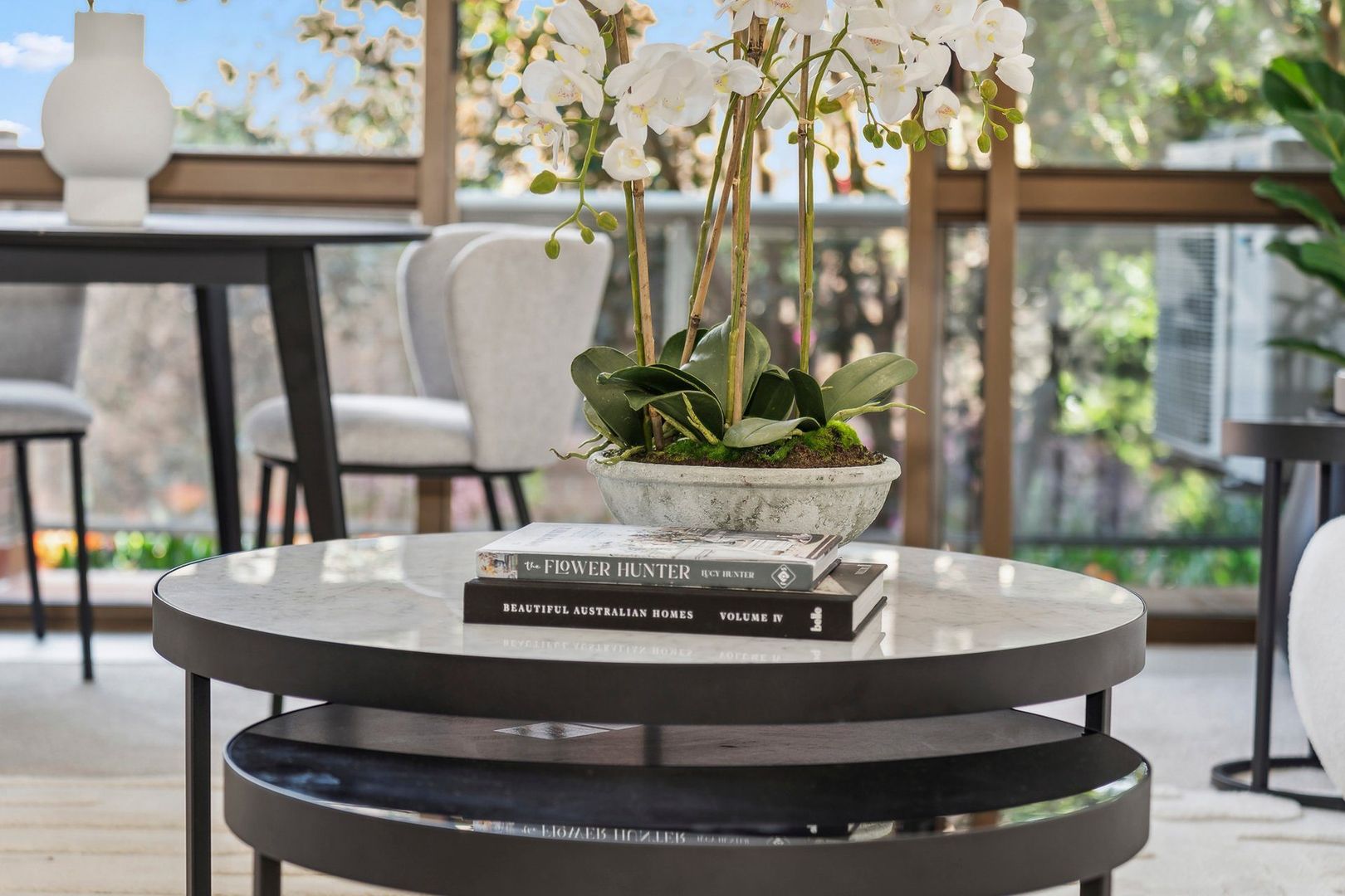 A serviced apartment surrounded by garden greenery