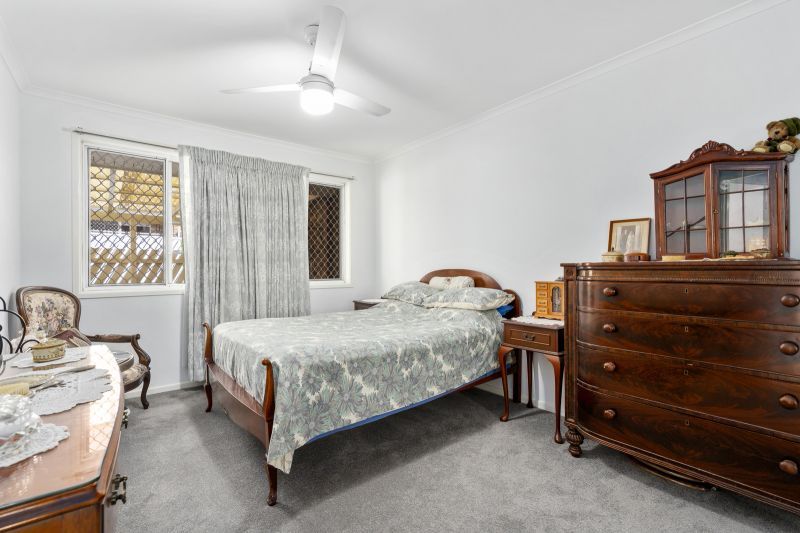 Beautiful two-bedroom, one bathroom villa with covered rear entertaining area.