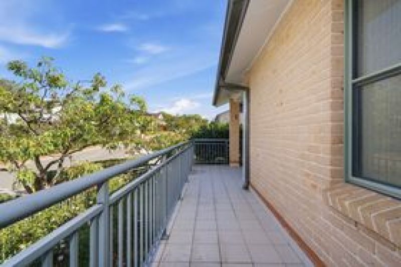One of a kind corner unit with a wrap around balcony