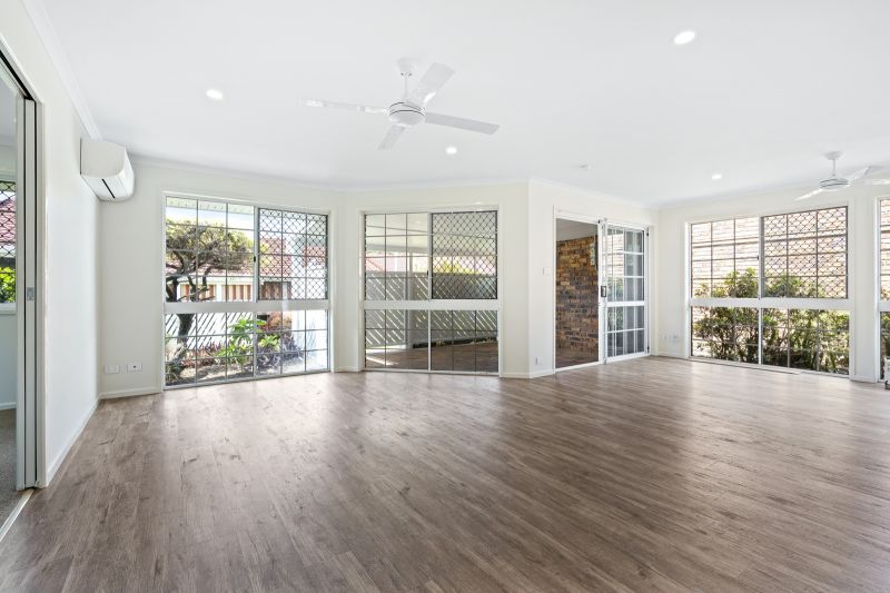 Beautiful two-bedroom, one bathroom villa with covered rear entertaining area.