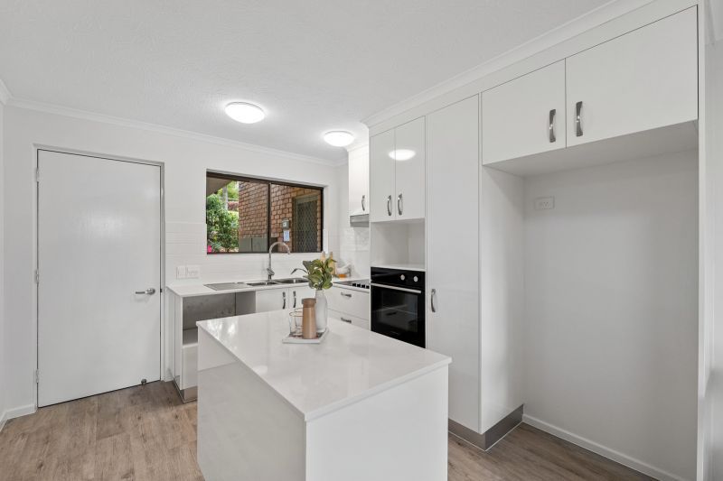 Charming one-bedroom plus study apartment surrounded by lush greenery