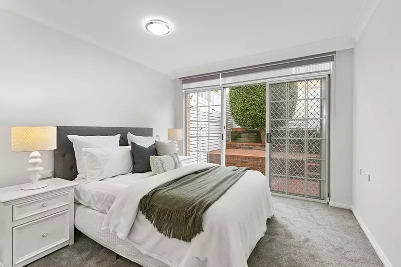 Ideally located, beautifully renovated ground floor sunny unit with large courtyard.