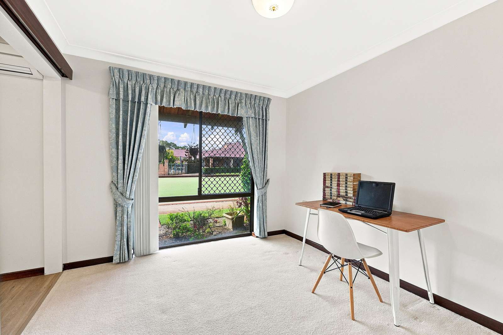 Bowling green views and a sunny east-facing courtyard