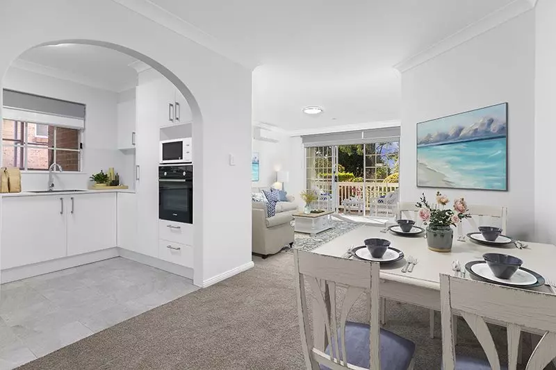 Newly renovated and superbly positioned unit with sunny front terrace and large courtyard.