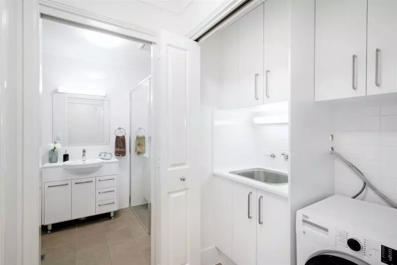 Ground floor apartment with enclosed balcony