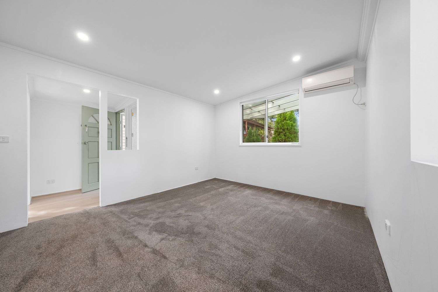 Tranquil Three-Bedroom Home with Sunroom